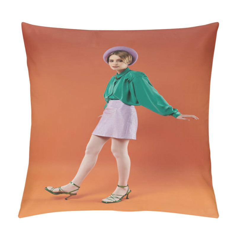 Personality  A Stylish Woman In A Green Blouse And Lavender Skirt Poses Playfully In A Vibrant Orange Studio. Pillow Covers