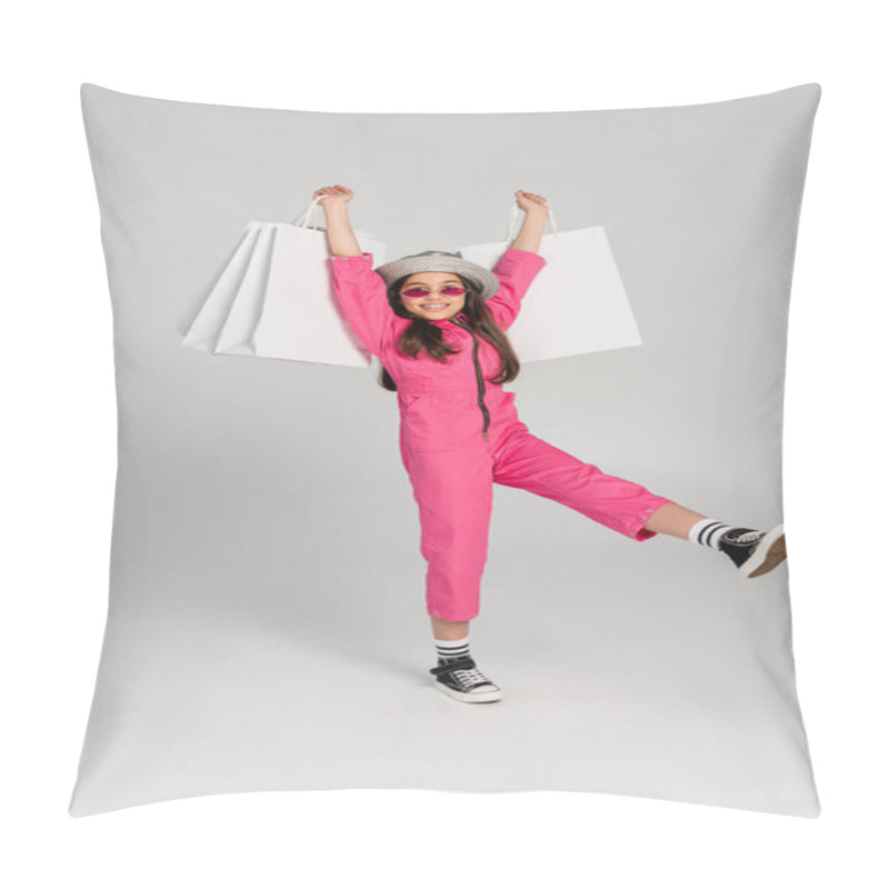 Personality  Cheerful Girl In Stylish Pink Outfit And Panama Hat Holding Shopping Bags On Grey Background Pillow Covers