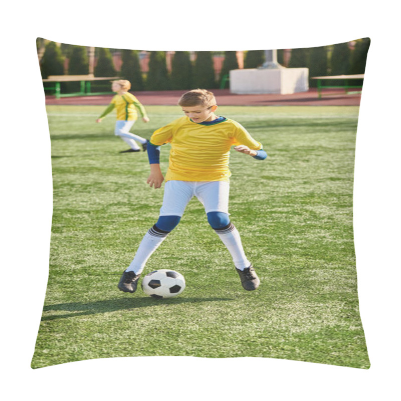 Personality  A Young Man Energetically Kicks A Soccer Ball On A Vast Green Field, Showcasing His Skills And Passion For The Sport. Pillow Covers