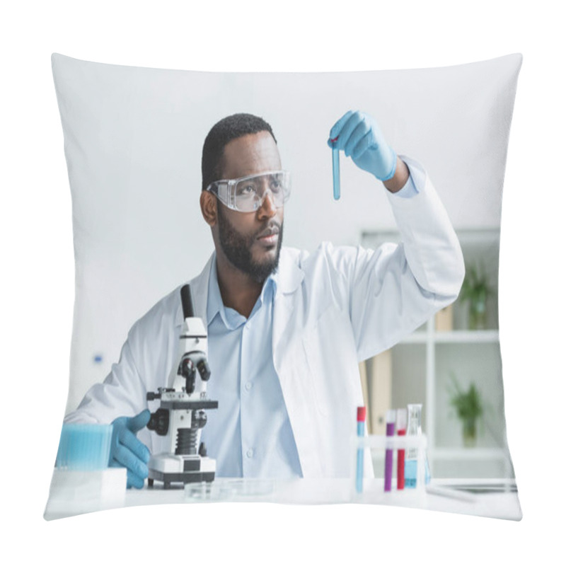 Personality  African American Scientist In Latex Gloves And Safety Goggles Holding Test Tube Near Microscope  Pillow Covers