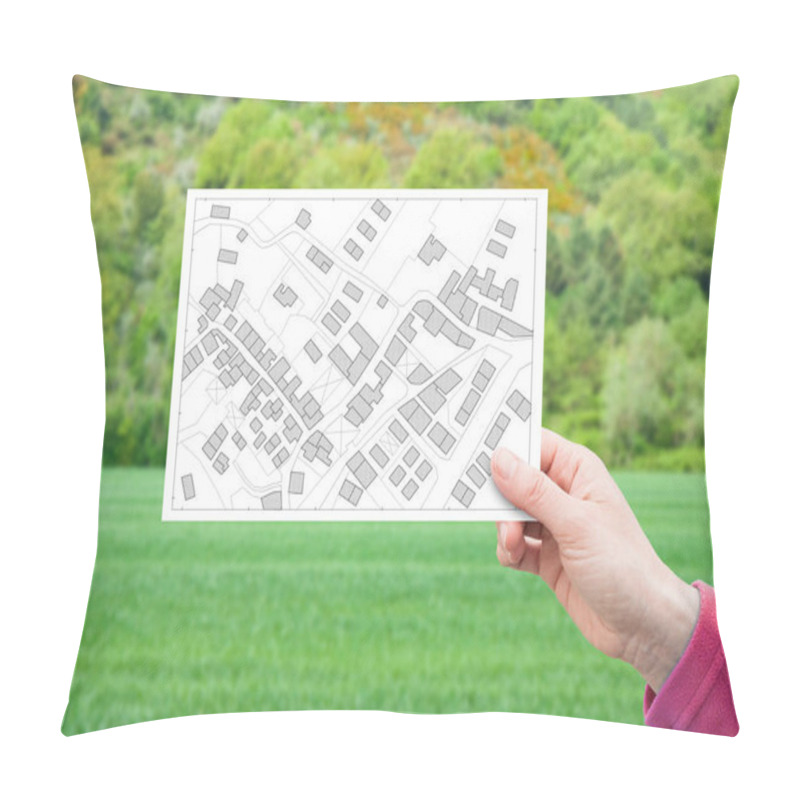 Personality  Land Plot Management - Real Estate Concept With A Vacant Land On A Green Residential Area Available For Building Construction With Hand Holding A Postcard About An Imaginary Cadastral Map Pillow Covers