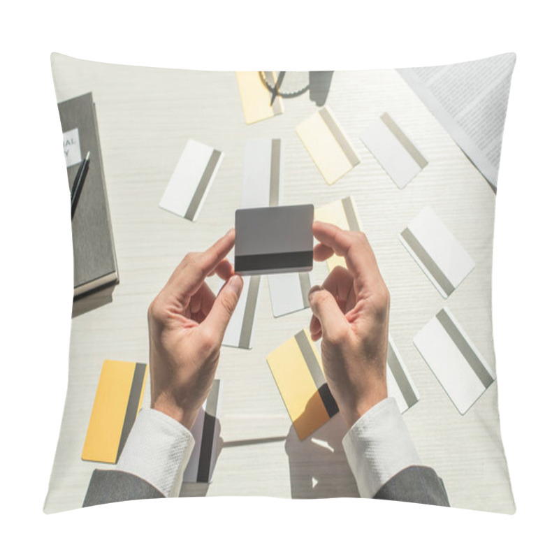 Personality  Cropped View Of Businessman Holding Credit Card Near Notebook And Business Document On White Textured Background Pillow Covers