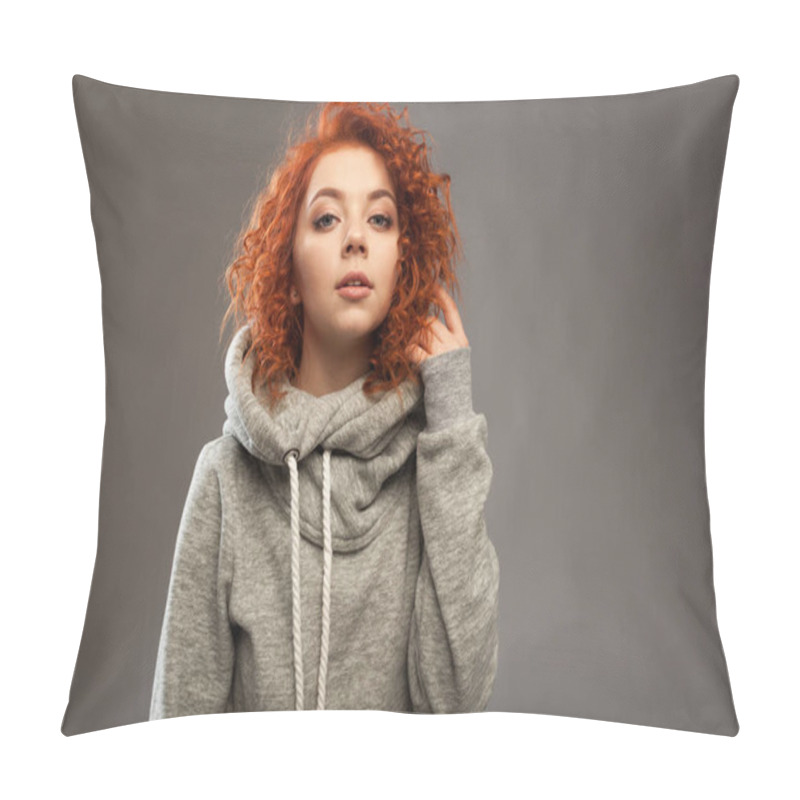 Personality  Portrait Of A Beautiful Young Curly-haired Girl With Fiery Red Hair Looking At The Camera On A Gray Background. Studio Photography. Warm Clothes Pillow Covers