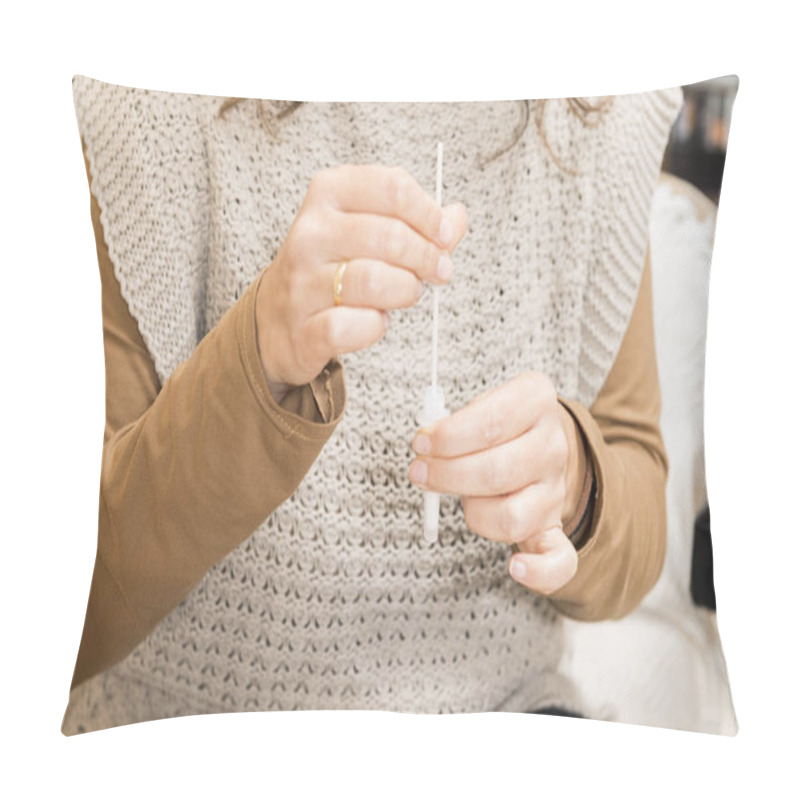 Personality  Detail Of A Woman's Hands Preparing A Sample For A Covid19 Antigen Self-test In Her Living Room. Pillow Covers