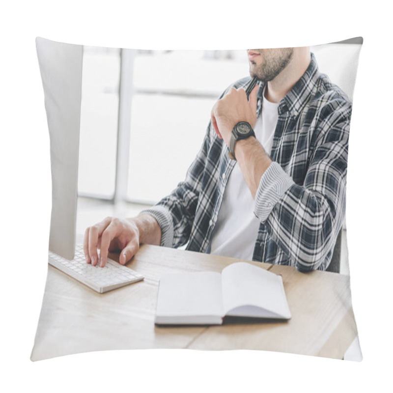 Personality  Cropped Shot Of Young Man Using Desktop Computer At Workplace Pillow Covers