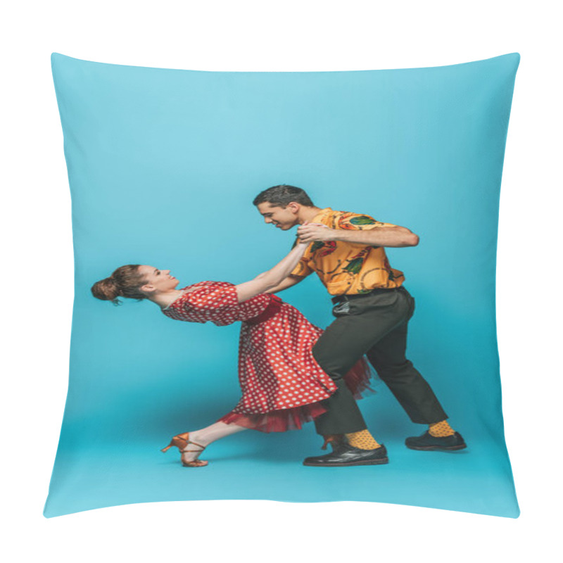 Personality  Side View Of Young Dancers Holding Hands While Dancing Boogie-woogie On Blue Background Pillow Covers