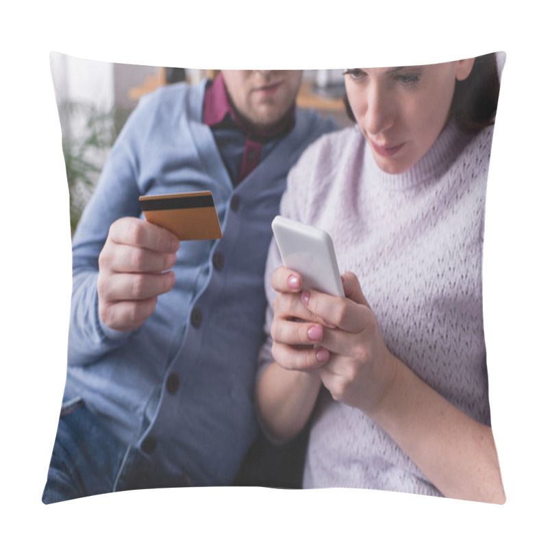 Personality  Woman Using Cellphone Near Husband With Credit Card At Home  Pillow Covers