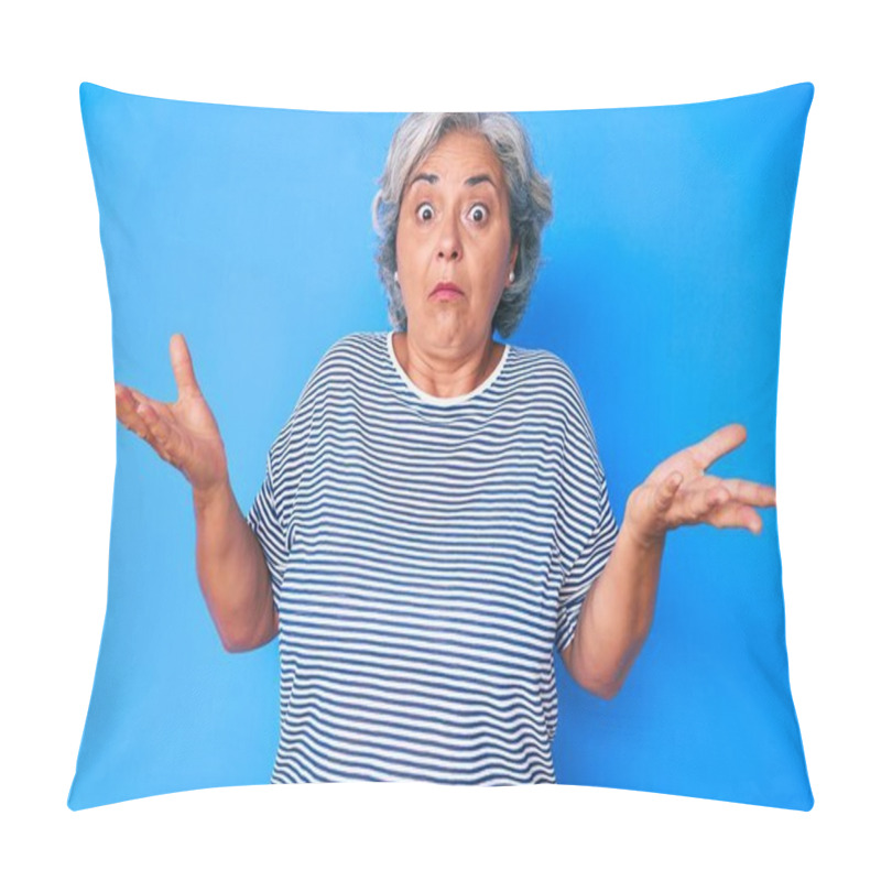 Personality  Senior Hispanic Grey- Haired Woman Wearing Casual Clothes Clueless And Confused Expression With Arms And Hands Raised. Doubt Concept.  Pillow Covers