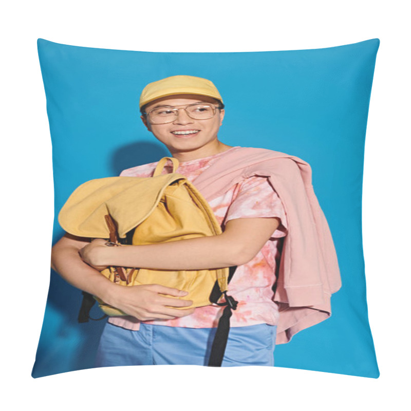 Personality  A Young Man In A Pink Shirt Strikes A Trendy Pose On A Blue Backdrop, Wearing A Vibrant Yellow Hat. Pillow Covers