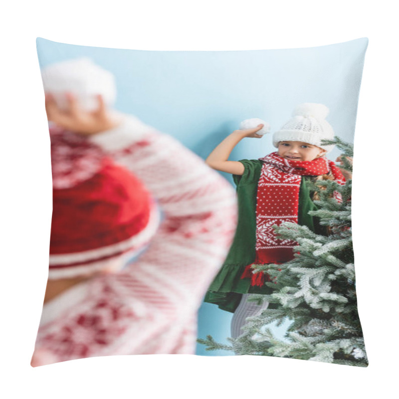 Personality  Selective Focus Of Girl In Hat And Scarf Holding Snowball While Playing With Brother On Blue  Pillow Covers