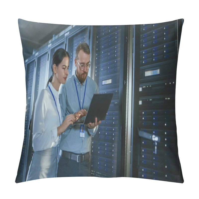 Personality  Bearded IT Technician In Glasses With A Laptop Computer And Beautiful Young Engineer Colleague Are Talking In Data Center While Working Next To Server Racks. Running Diagnostics Or Doing Maintenance Work. Pillow Covers