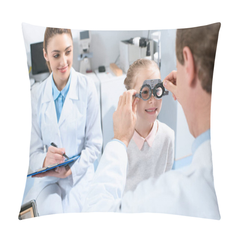 Personality  Ophthalmologists Examining Kid Eyes With Trial Frame And Writing Diagnosis Pillow Covers