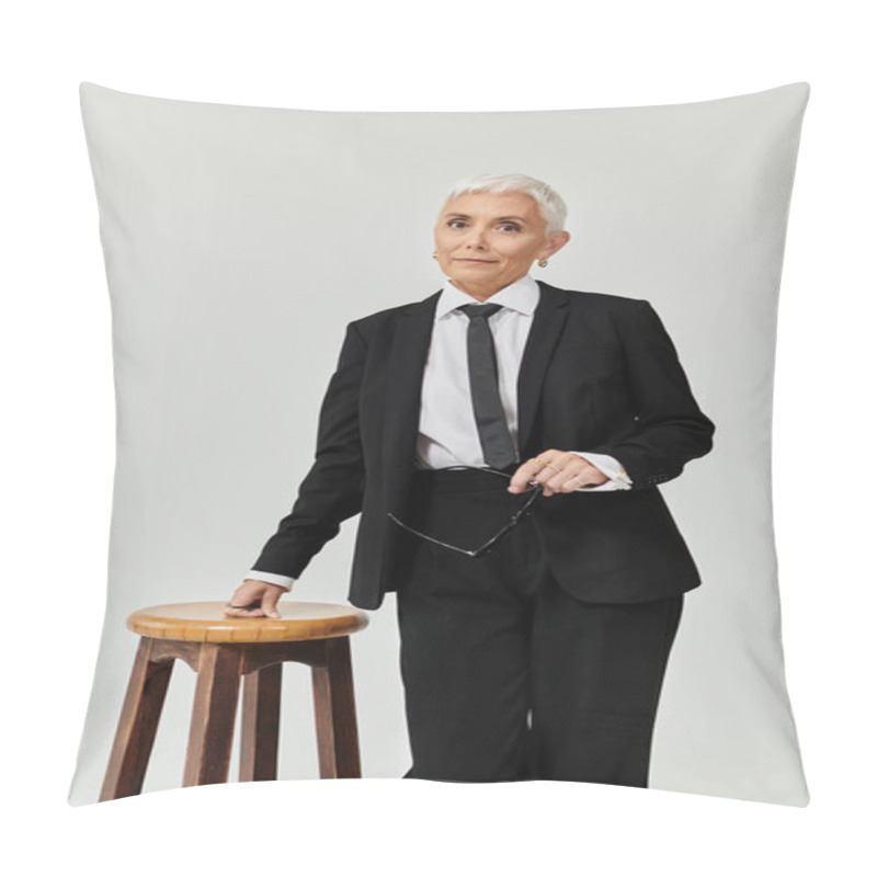 Personality  An Elegant Mature Woman Stands Confidently Next To A Wooden Stool. Pillow Covers