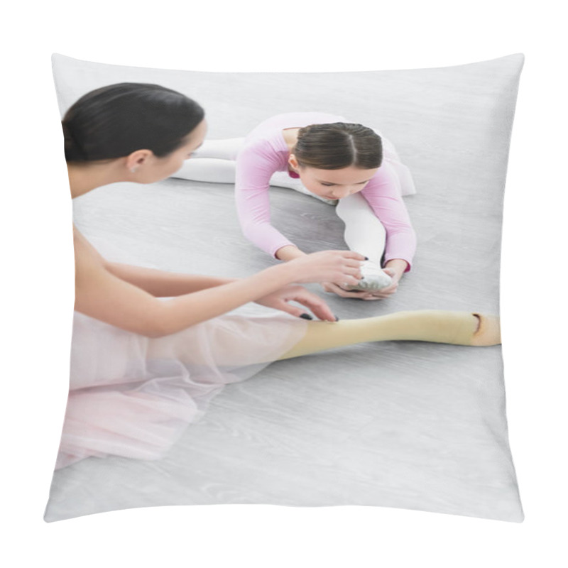 Personality  Slim Girl Stretching On Floor Near Blurred Dance Teacher In Ballet School Pillow Covers