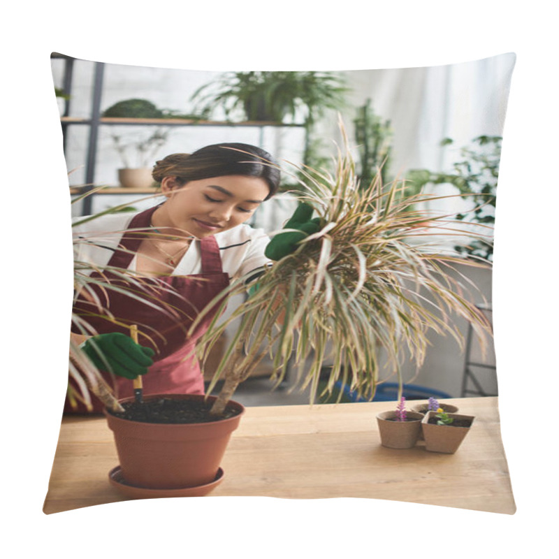 Personality  A Beautiful Asian Woman In An Apron Tends To A Potted Plant In Her Greenhouse. Pillow Covers