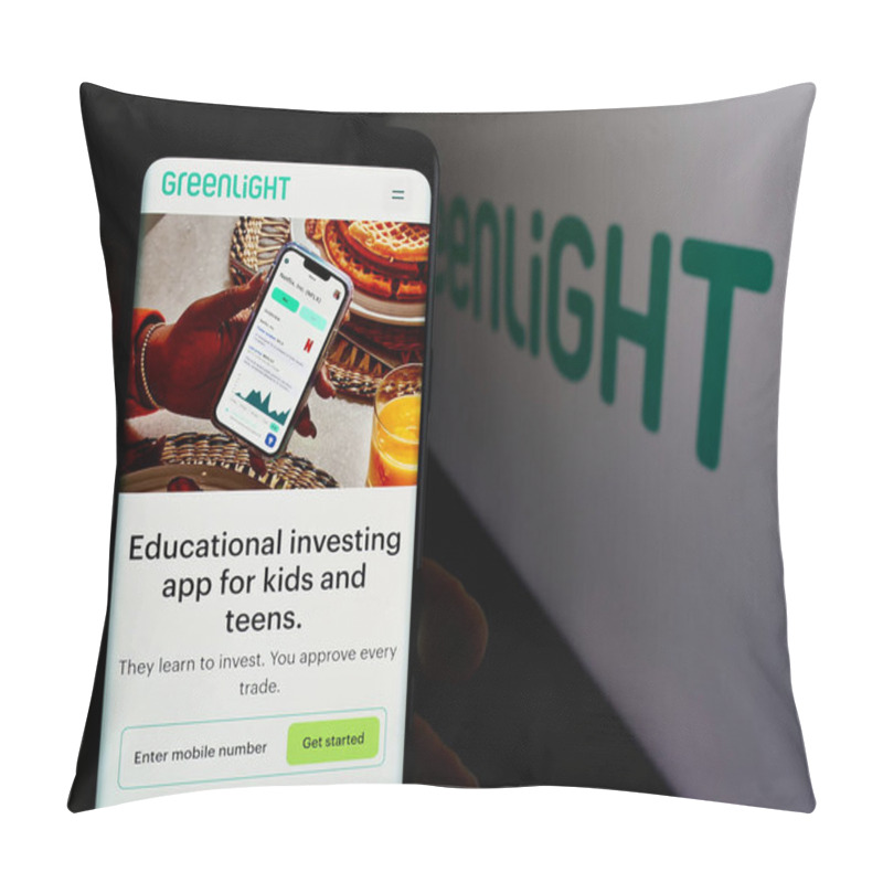 Personality  Stuttgart, Germany - 08-19-2024: Person Holding Smartphone With Web Page Of US Fintech Company Greenlight Financial Technology Inc. With Logo. Focus On Center Of Phone Display. Pillow Covers