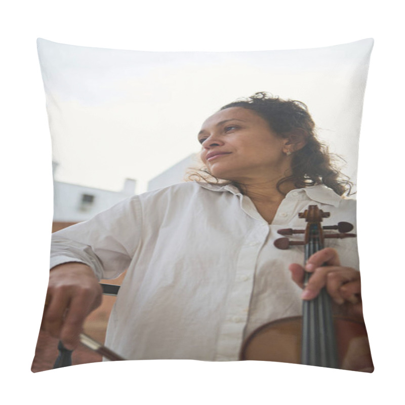 Personality  A Serene Woman In A White Shirt Holds A Violin, Standing On An Outdoor Balcony. The Soft Background Of The Urban Scene Emphasizes The Peaceful And Contemplative Demeanor Of The Musician. Pillow Covers