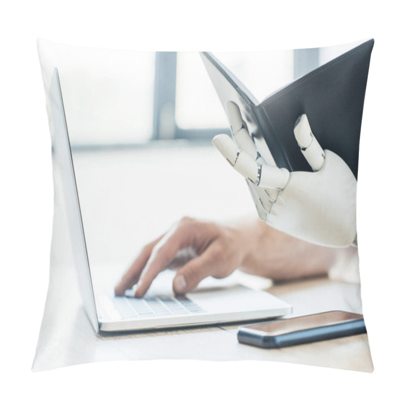 Personality  Close-up View Of Robotic Arm Holding Notebook And Human Hand Using Laptop At Workplace Pillow Covers