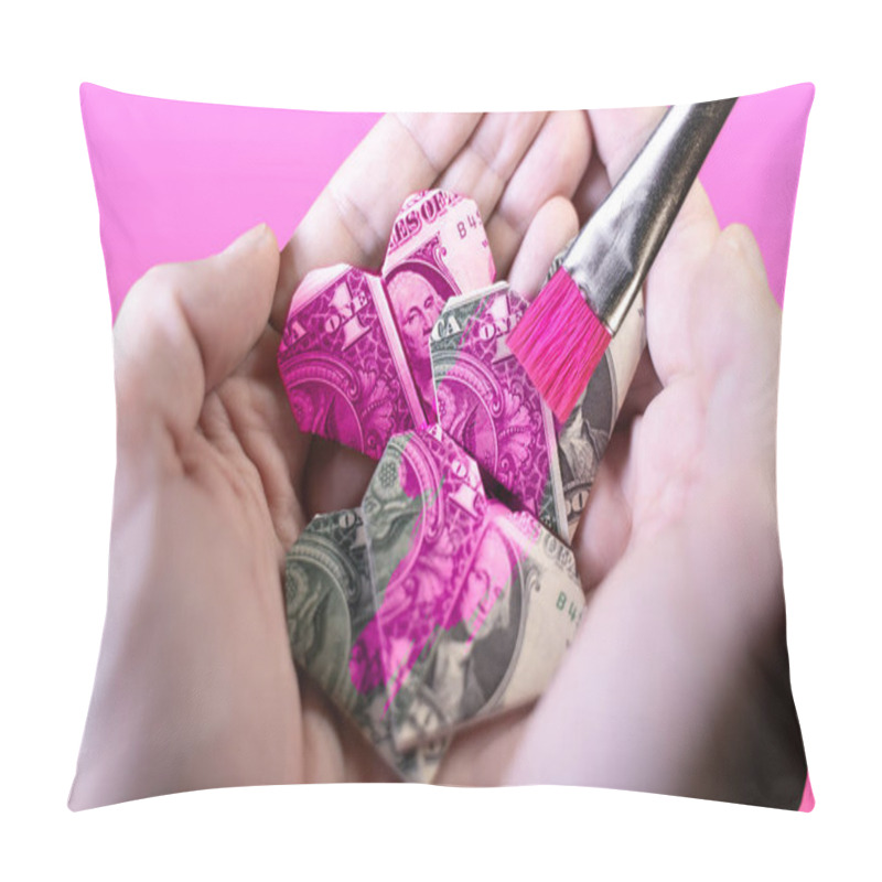 Personality  Close-up Of Hands Holding Folded Dollar Bills Shaped As Hearts, Partially Painted Pink With A Brush, Symbolizing Pinkwashing. Pinkwashing Involves Organizations Presenting Themselves As Gay-friendly Pillow Covers