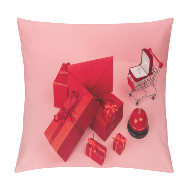 Personality  High Angle View Of Red Wrapped Gift Boxes And Envelope Near Shopping Cart With Engagement Ring On Pink  Pillow Covers