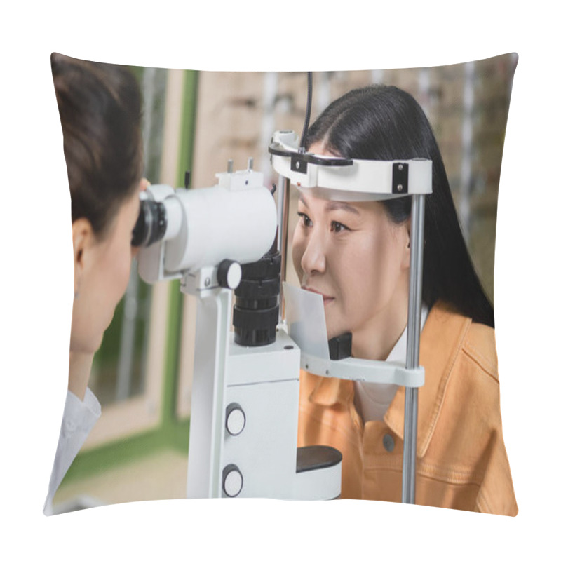 Personality  Blurred Optometrist Testing Eyesight Of Asian Woman On Vision Screener In Optics Shop Pillow Covers