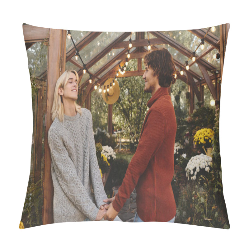 Personality  Two Handsome Men Hold Hands And Smile At Each Other In A Charming Greenhouse Adorned With Vibrant Flowers And Fairy Lights. The Warm Ambiance Suggests A Romantic Afternoon In Nature. Pillow Covers