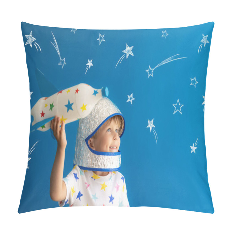 Personality  Happy Child Playing With Toy Rocket Against Blue Background. Kid Pretend To Be Astronaut. Imagination And Children Dream Concept Pillow Covers