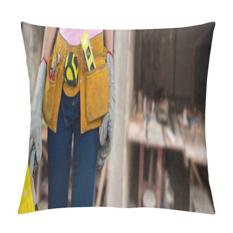 Personality  Woman With Tool Belt And Holding Hard Hat Against Workshop Pillow Covers