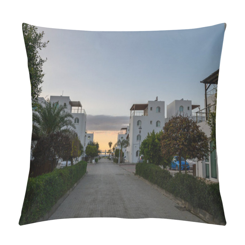 Personality  Tranquil Walkway Flanked By White Structures And Lush Foliage Leads To A Beautiful Sunset Over The Sea Horizon. Pillow Covers