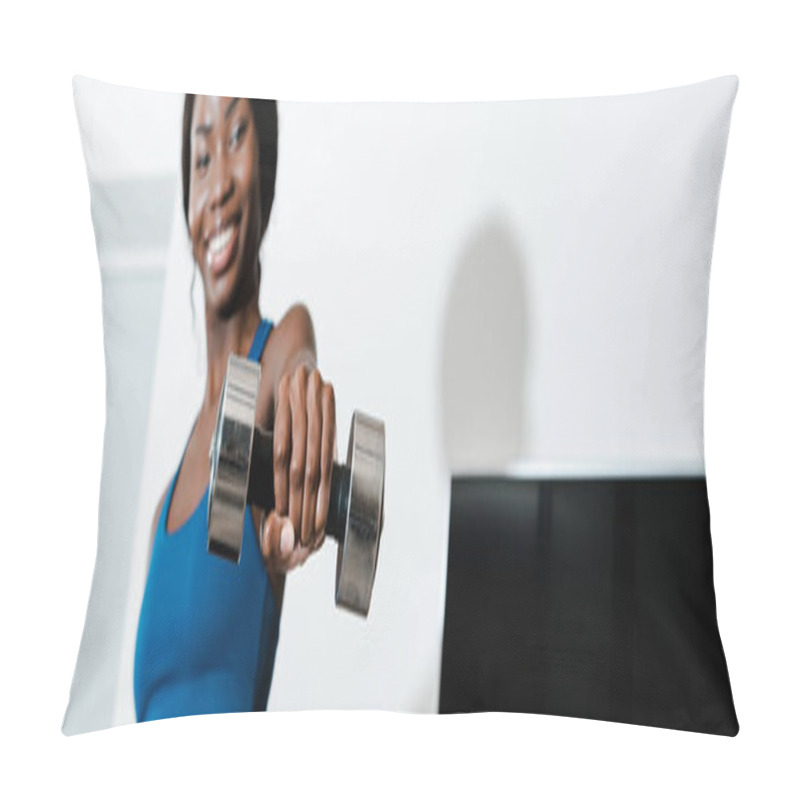 Personality  Horizontal Image Of African American Sportswoman Holding Dumbbell With Outstretched Hand And Smiling In Living Room Pillow Covers