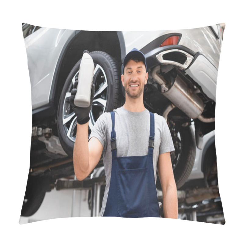 Personality  Low Angle View Of Happy Mechanic In Cap Holding Bottle With Car Oil  Pillow Covers