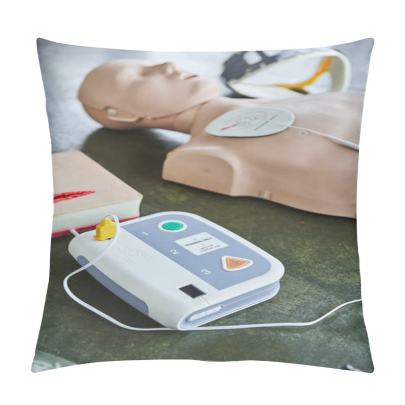 Personality  Automated External Defibrillator Near Wound Care Simulator, CPR Manikin And Neck Brace On Blurred Background On Floor In Training Room, Medical Equipment For First Aid Training  Pillow Covers