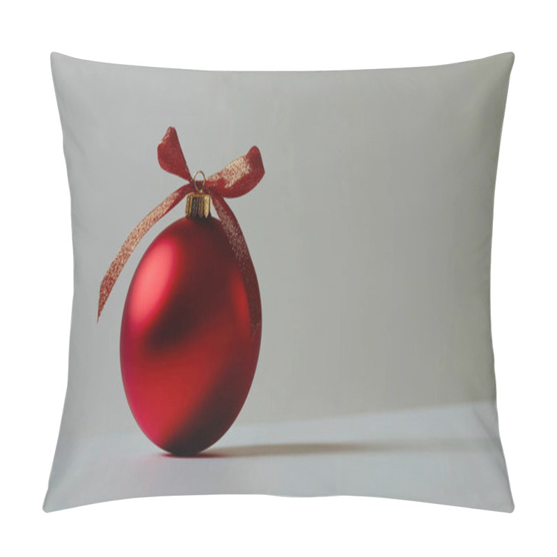 Personality  Shiny Red Christmas Ornament With A Gold Ribbon On A Simple Background Pillow Covers