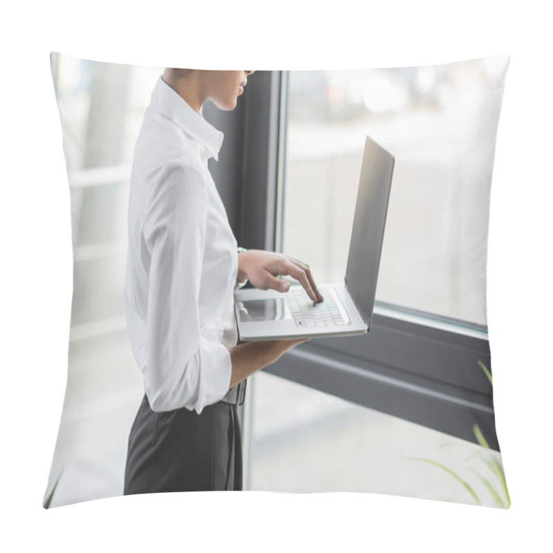 Personality  Cropped View Of African American Businesswoman In White Blouse Using Laptop With Blank Screen Near Window In Office Pillow Covers