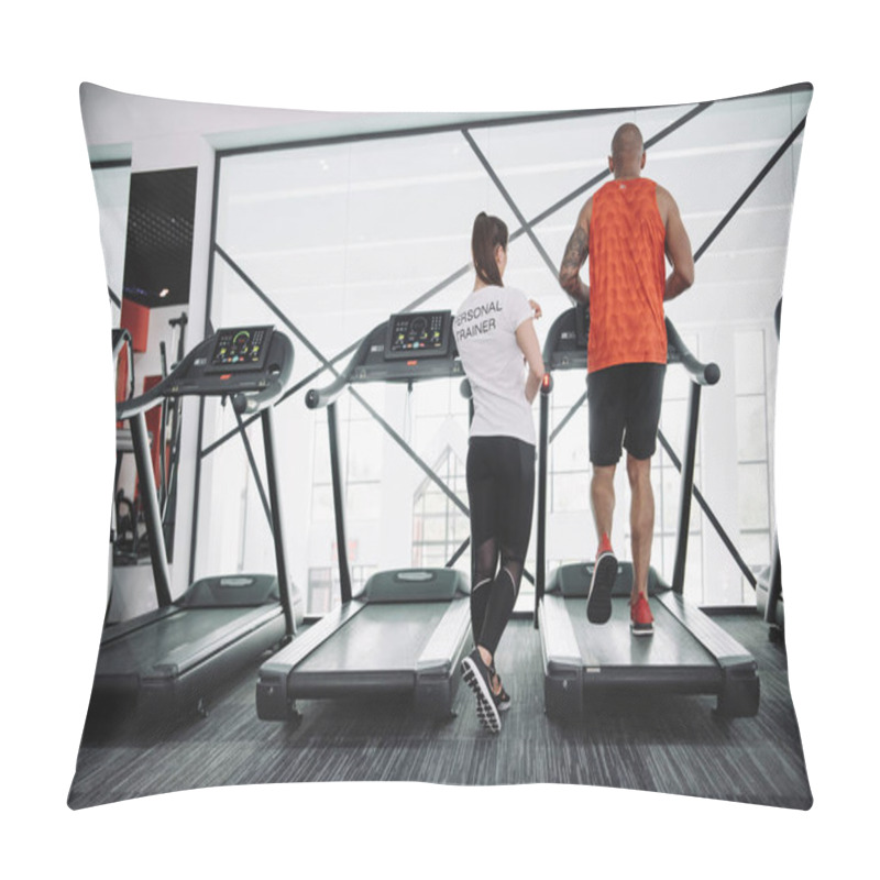 Personality  Back View Of Personal Trainer Supervising African American Sportsman Running On Treadmill Pillow Covers