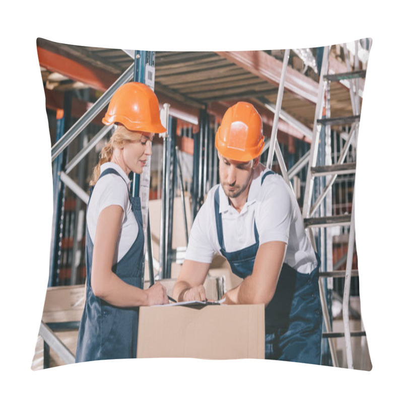 Personality  Concentrated Warehouse Workers Looking At Clipboard While Standing Near Cardboard Box Pillow Covers