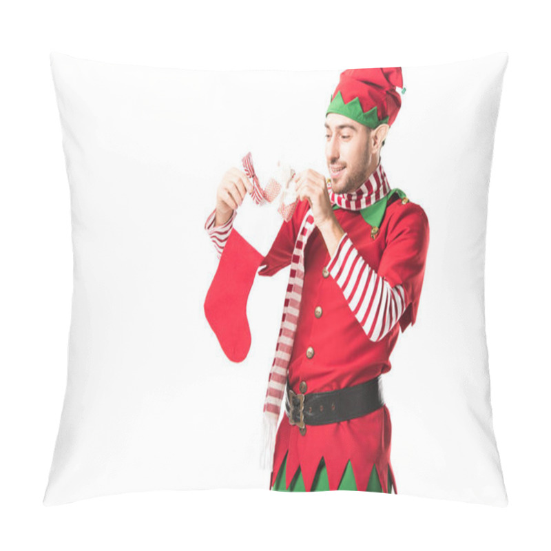 Personality  Man In Christmas Elf Costume Putting Present In Red Christmas Stocking Isolated On White Pillow Covers