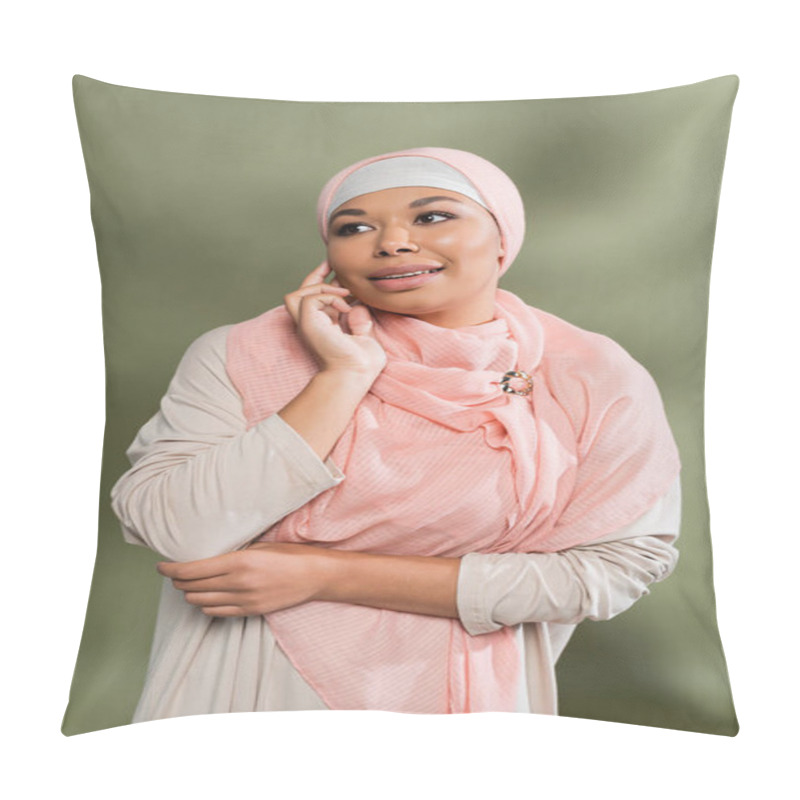 Personality  Stylish Multiracial Woman In Abaya Dress And Pink Hijab Touching Face And Looking Away On Green Background Pillow Covers