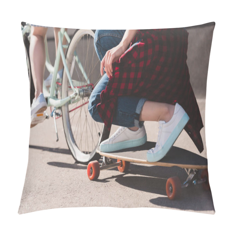 Personality  Cropped Shot Of Woman Riding Bicycle And Towing Her Female Friend On Skateboard  Pillow Covers