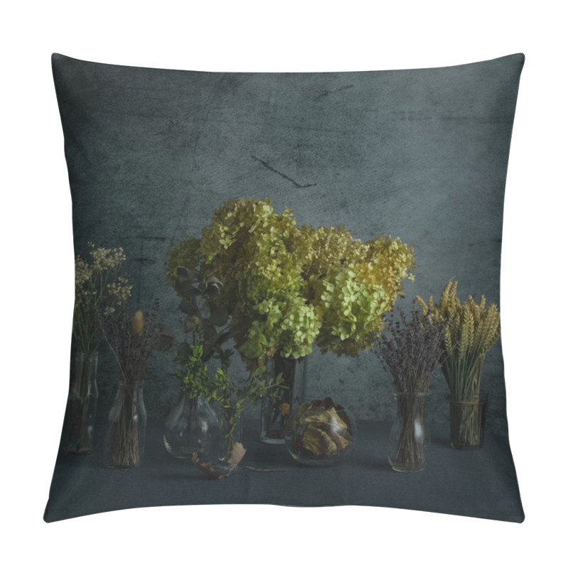 Personality  Still Life Image Of Dried Flowers And Plants In Glass Bottles On Dark Blue Grunge Background Pillow Covers