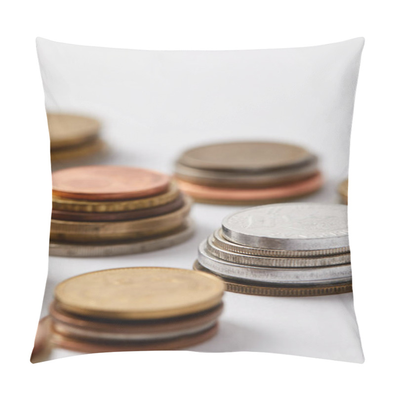 Personality  Close-up Shot Of Stacks Of Various Coins On White Pillow Covers