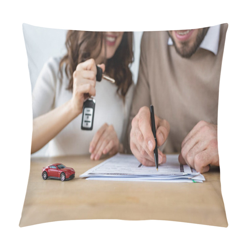 Personality  Selective Focus Of Red Toy Car Near Bearded Man Signing Contract And Woman Holding Car Key  Pillow Covers