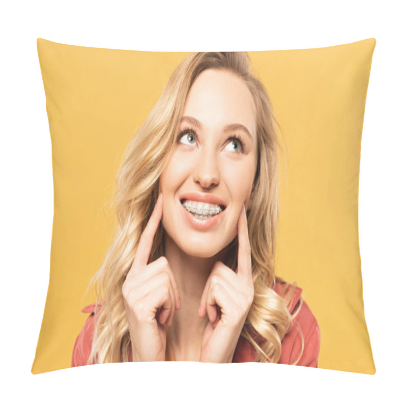 Personality  Smiling Blonde Woman With Dental Braces Looking Up Isolated On Yellow Pillow Covers