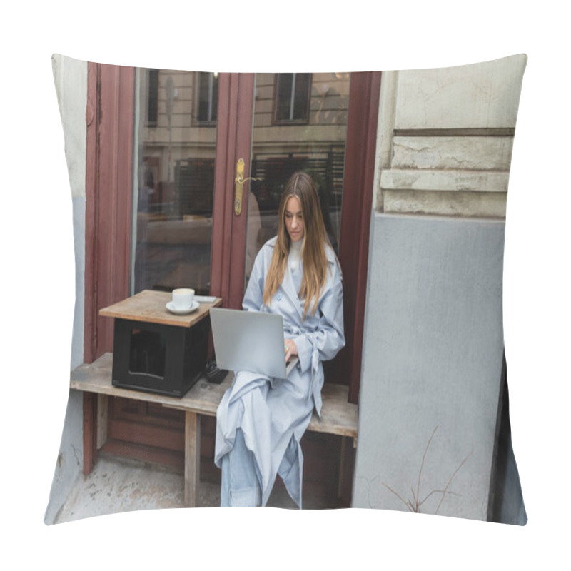 Personality  Young Freelancer In Blue Trench Coat Using Laptop While Sitting Next To Cup Of Coffee In Outdoor Cafe In Vienna   Pillow Covers