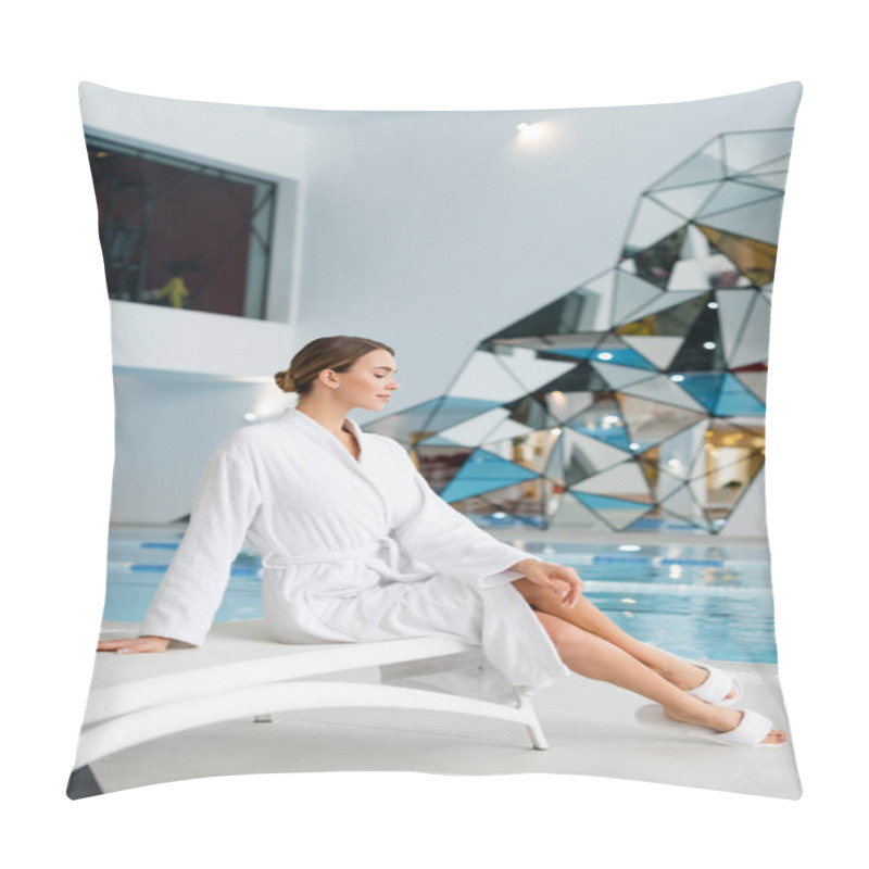 Personality  Side View Of Pleased Young Woman In White Bathrobe Sitting On Deck Chair In Spa Center Pillow Covers