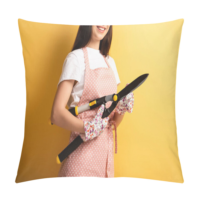 Personality  Cropped View Of Smiling Girl In Apron And Textile Gloves Holding Gardening Scissors On Yellow Background Pillow Covers