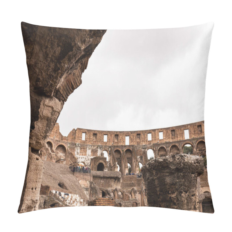 Personality  ROME, ITALY - JUNE 28, 2019: Ruins Of Colosseum And Tourists Under Grey Sky Pillow Covers