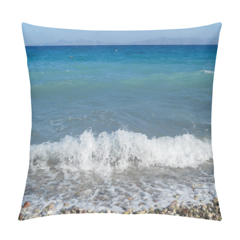 Personality  Gentle Waves Lap Against A Pebbled Shore Under A Clear Sky. The Serene Blue Waters Stretch Into The Horizon, Creating A Peaceful Atmosphere Ideal For Relaxation Or Reflection. Pillow Covers