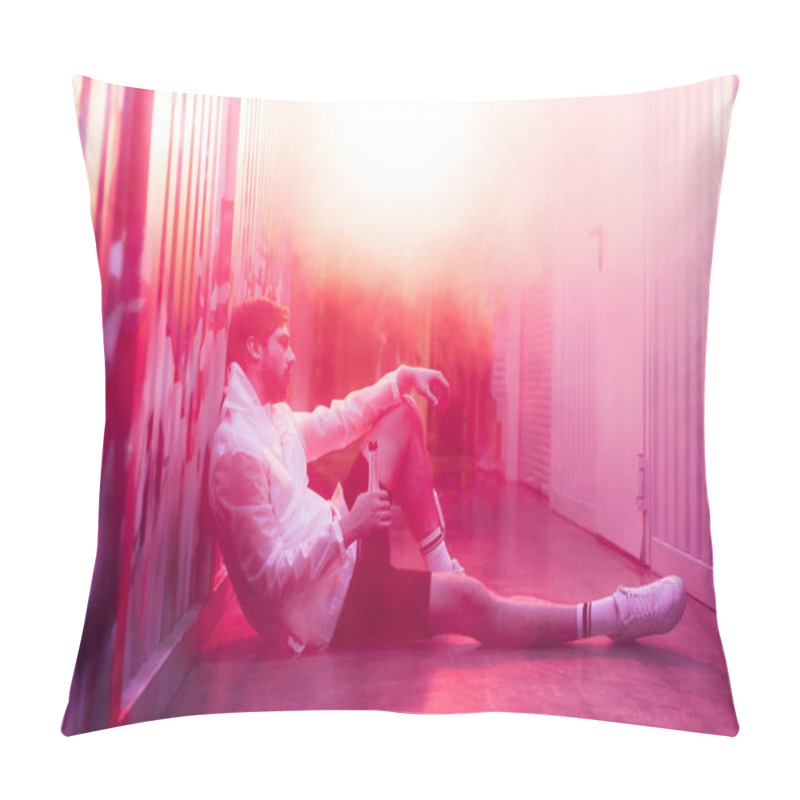 Personality  Side View Of Handsome Man Sitting On Floor And Holding Bottle  Pillow Covers