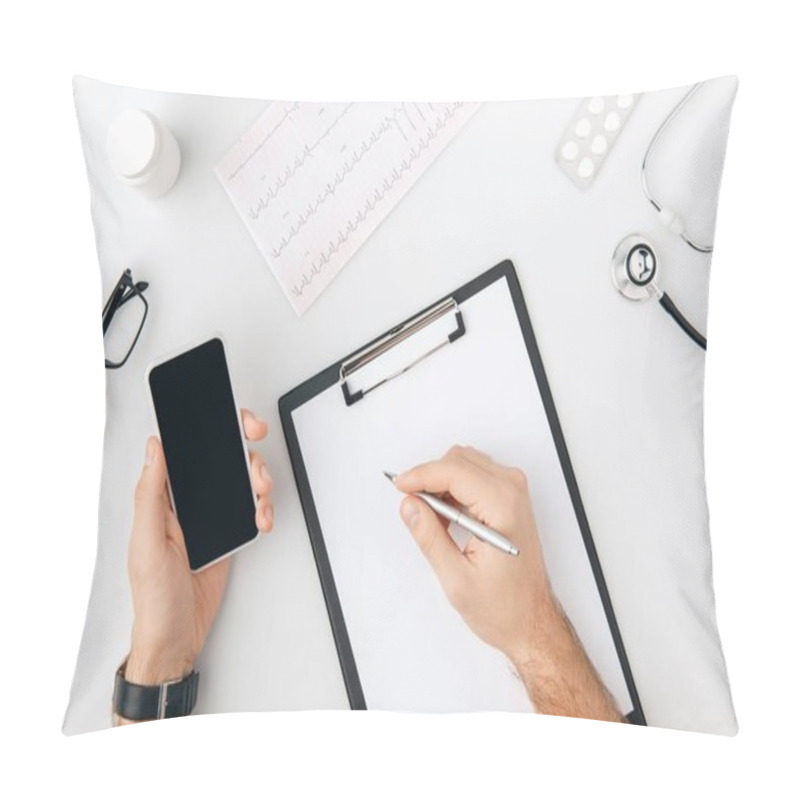 Personality  Top View Of Hand With Pen Over Paper On Folder And Smartphone In Another One Isolated On White Background      Pillow Covers